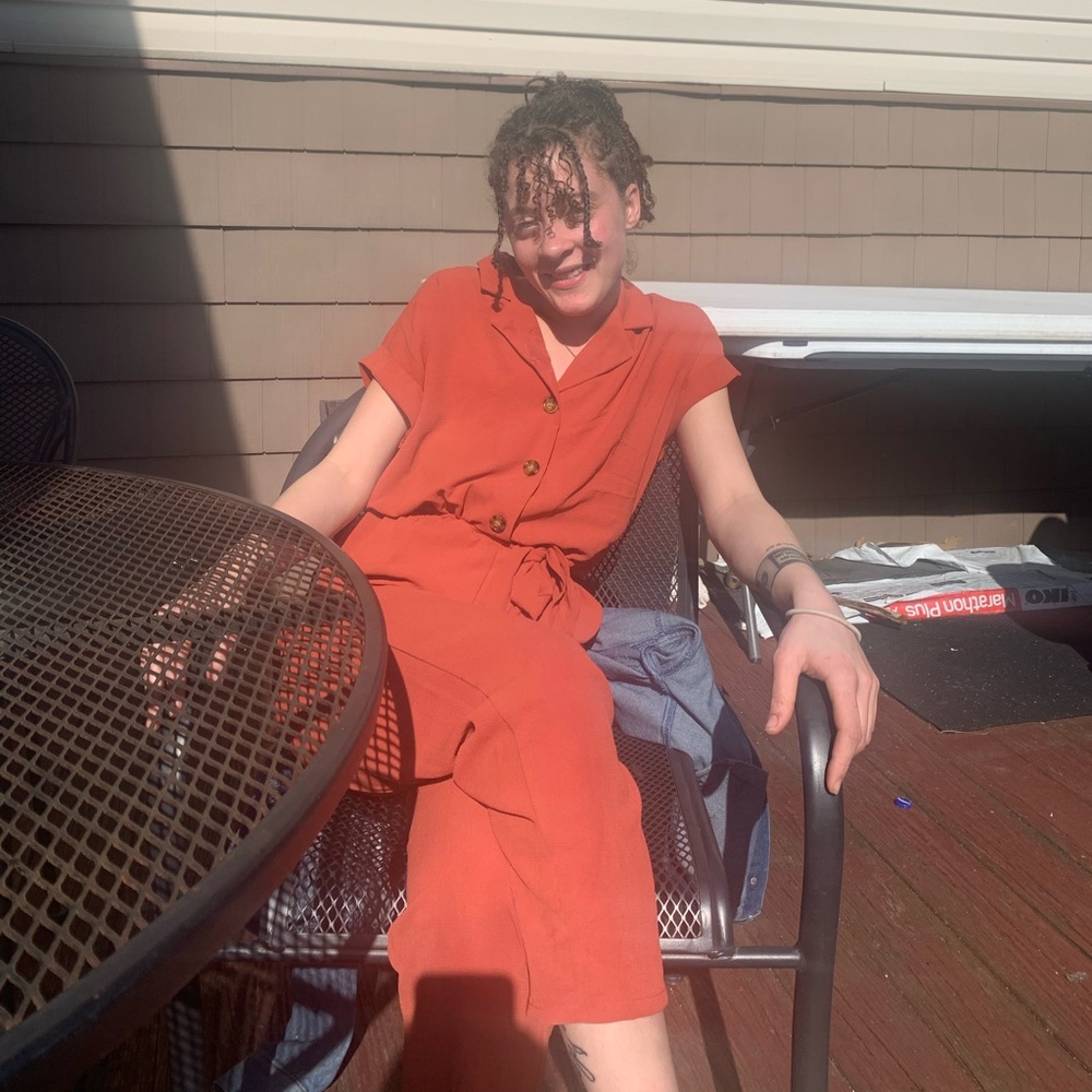 red orange jumpsuit